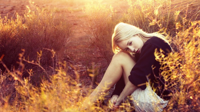 sitting, blonde, girl outdoors, girl, sunlight, nature, field