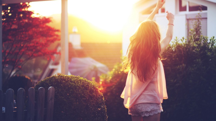 girl, girl outdoors, sunlight, arms up, fence, trees, Golden Hour, brunette