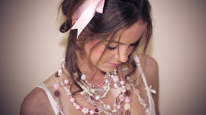 girl, looking down, brunette, ribbon, freckles