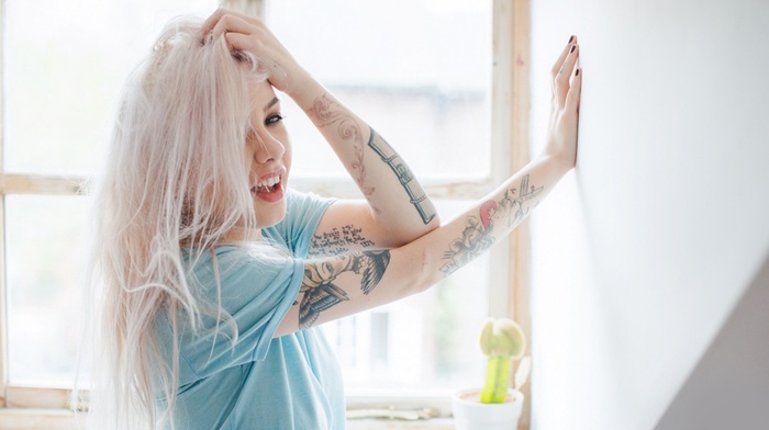 hands on head, white hair, tattoo, girl