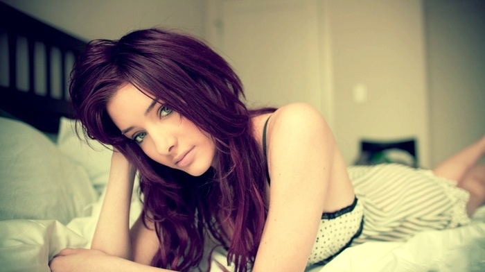lying down, Susan Coffey, in bed, blue eyes, looking at viewer, purple hair, dyed hair, model, lying on front, hands in hair, girl, redhead